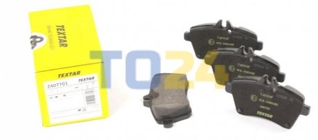 Дисковые тормозные колодки (передние) TEXTAR 2407701 (фото 1)